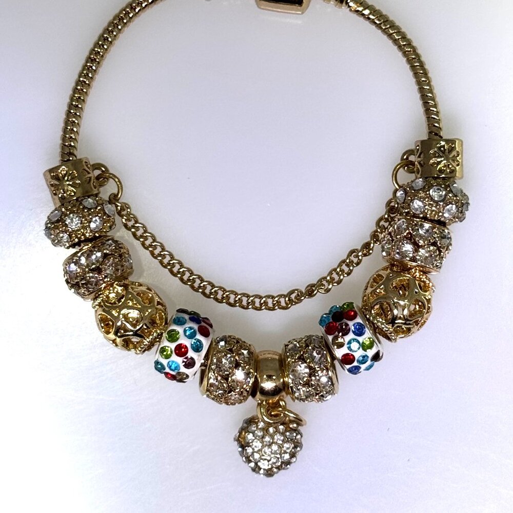 Gold tone, flashy European style slide charm bracelet, lots of bling, NWOT